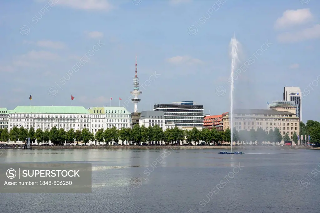 View over the Inner Alster Lake with Alster Fountain towards the street of Neuer Jungfernstieg, Hotel Vier Jahreszeiten or Four Seasons Hotel and the ...