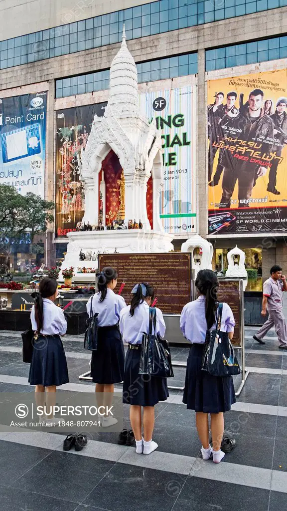 Schoolgirls at the Trimurti Shrine in front of the Central World shopping center, Bangkok, Central Thailand, Thailand