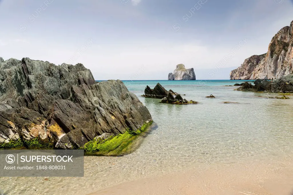 Spiaggia di Masua bay with the Pan di Zuccherof rock island in the sea, Masua, Iglesiente, Sardinia, Italy