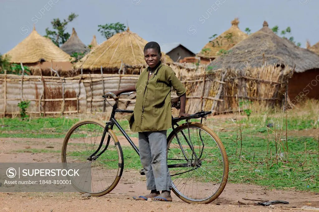 Cyclist in a village, Garoua, North Region, Cameroon