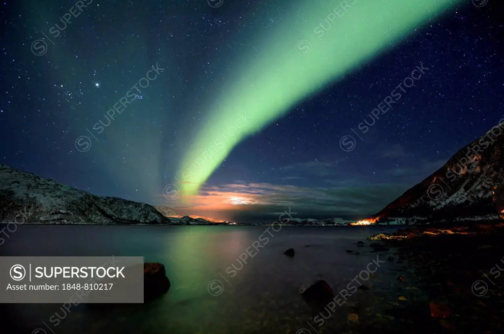 Northern Lights over fjord with winter landscape, Sommeroya, Tromsø, Troms, Northern Norway, Norway