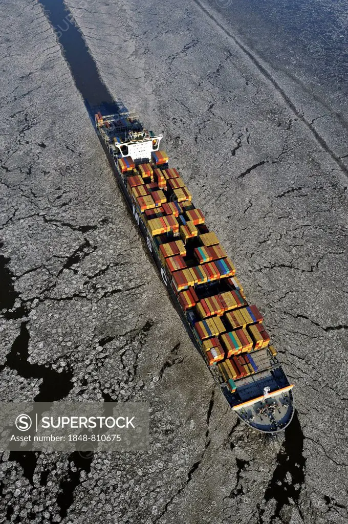 Container ship on the Elbe River with ice flow, aerial view, Hamburg, Hamburg, Germany