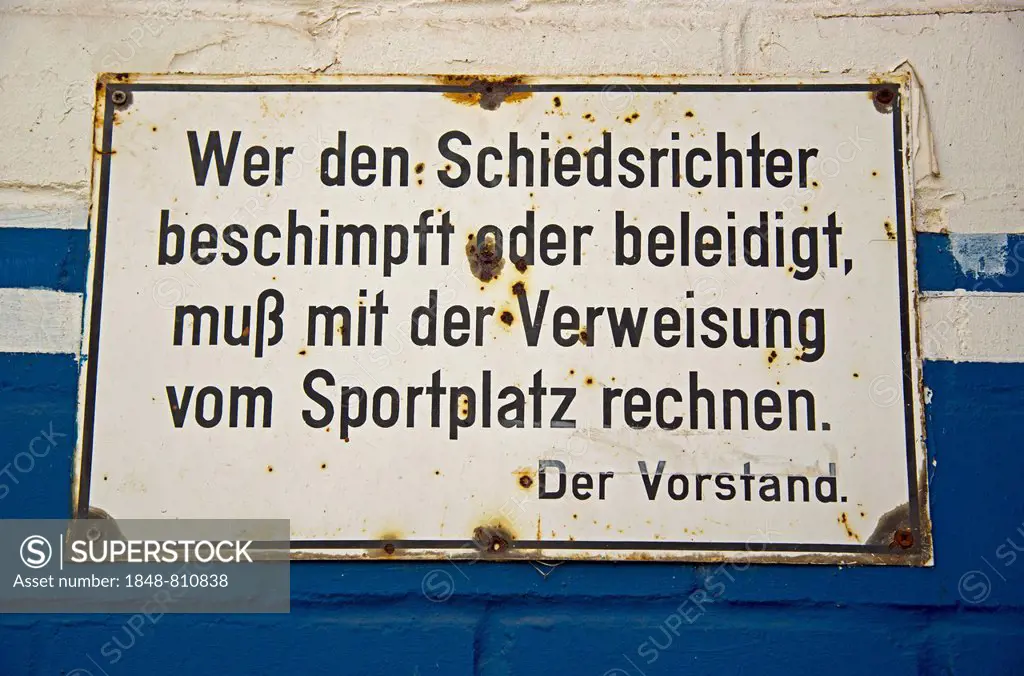 Sign at the entrance of a sports field, Wer den Schiedsrichter beschimpft oder beleidigt, muß mit der Verweisung vom Sportplatz rechnen, German for Wh...