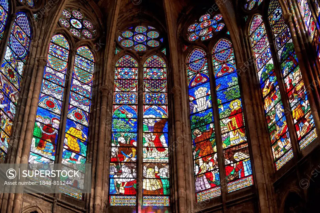 Medieval Gothic stained glass window showing scenes from the Martyrdom of Saint Denis, Cathedral Basilica of Saint Denis, Basilique Saint-Denis, Paris...