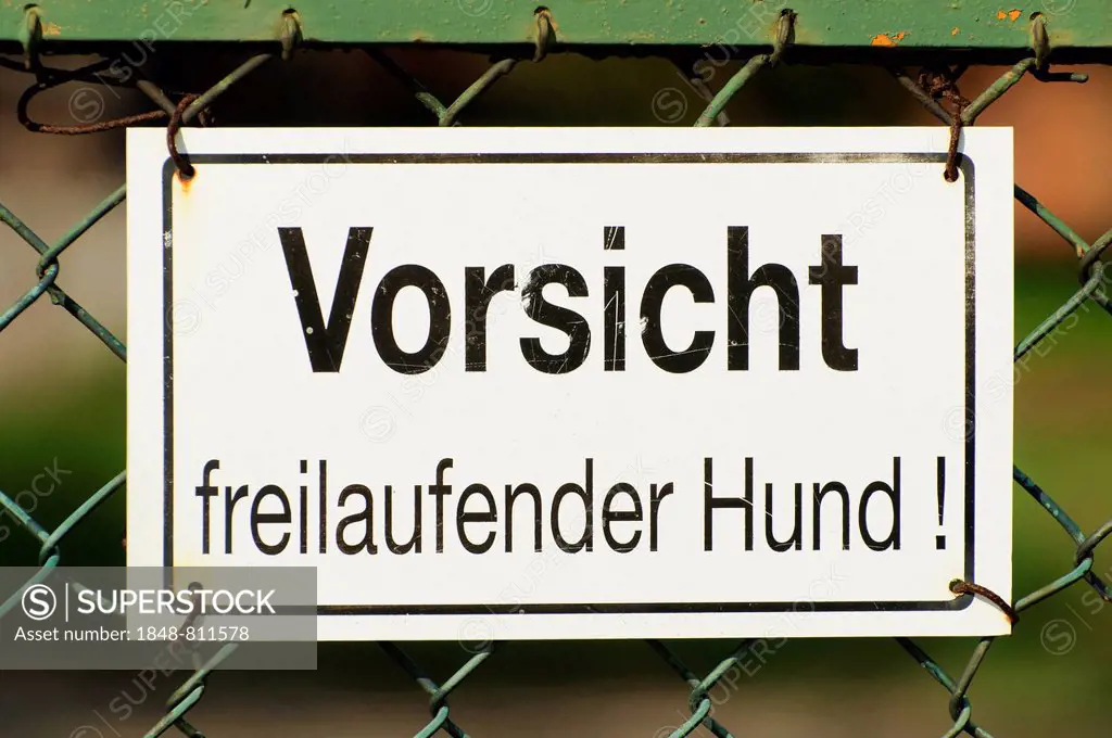 Sign, Vorsicht freilaufender Hund!, German for Beware of the dog!, Hamburg, Germany