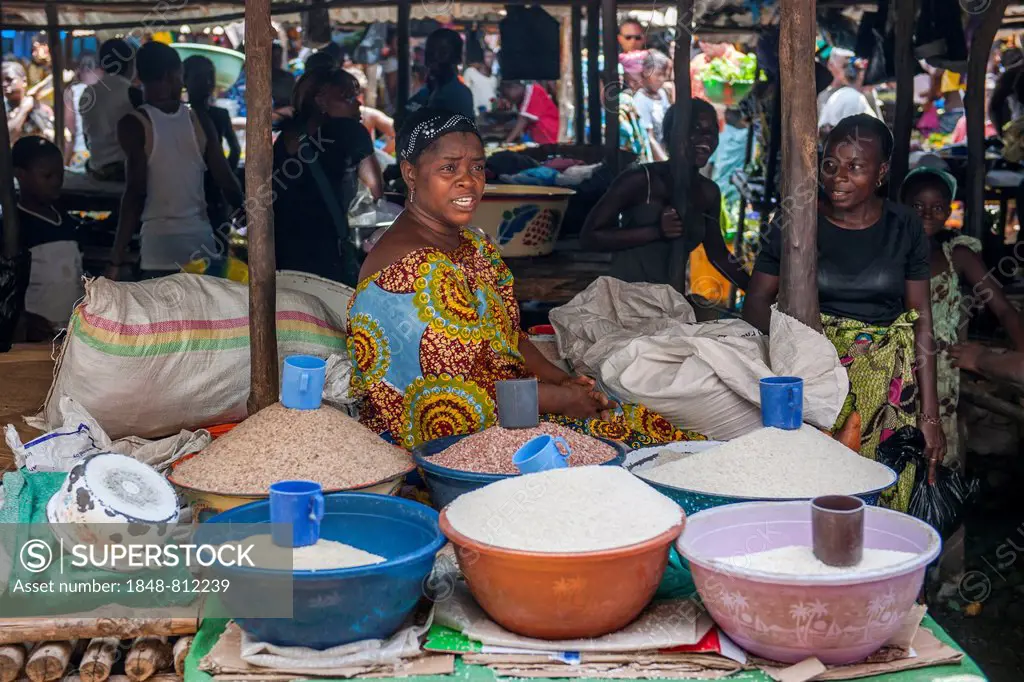 Grain seller at a street market, Bo, Southern Province, Sierra Leone