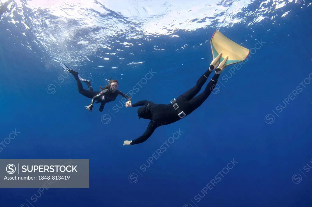 Freedivers, one wearing a monofin, Kas, Lycia, Province of Antalya, Turkey