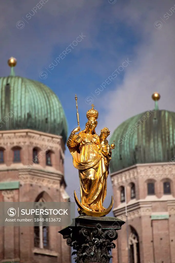 Statue of the Virgin Mary, Mariensaeule, Marian column, with the towers of the Munich Frauenkirche church at back, Munich, Upper Bavaria, Bavaria, Ger...