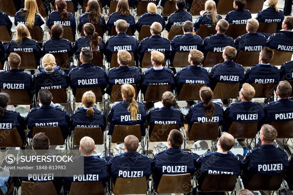 Police commissioner candidates, trainees of the Polizei NRW or North Rhine-Westphalia Police, sitting at a meeting in an auditorium, North Rhine-Westp...