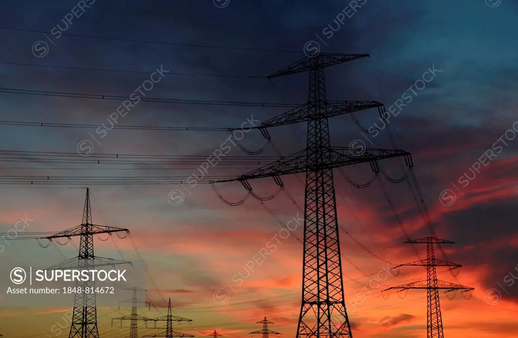 High voltage power lines at sunset