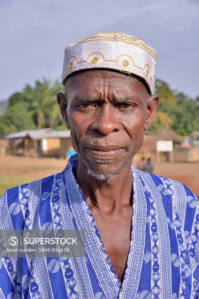 Portrait of a man in Muslim dress, Waiima, Kono District, Sierra Leone