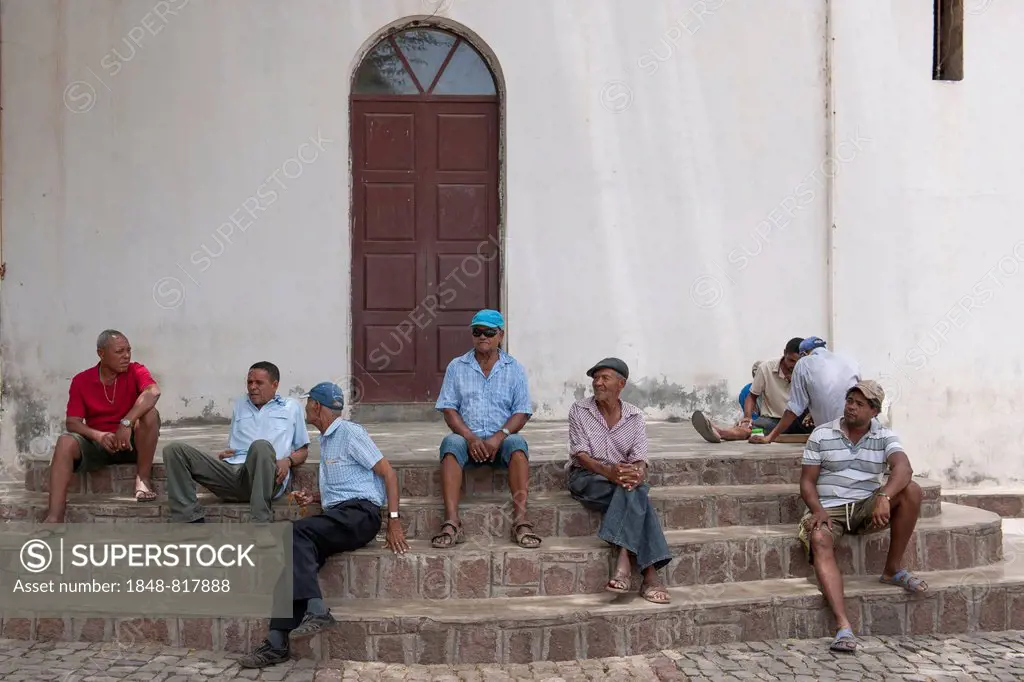 Men meeting on the steps of the church Cha de Igreja, Santo Antío, Cape Verde