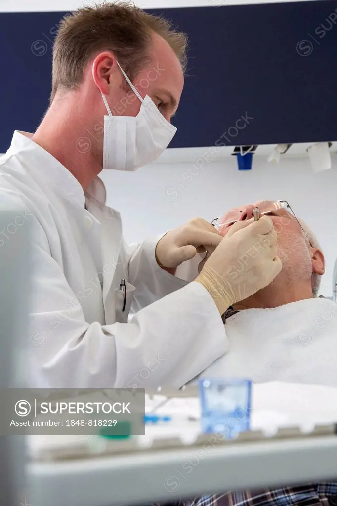 Senior man at the dentist, Germany