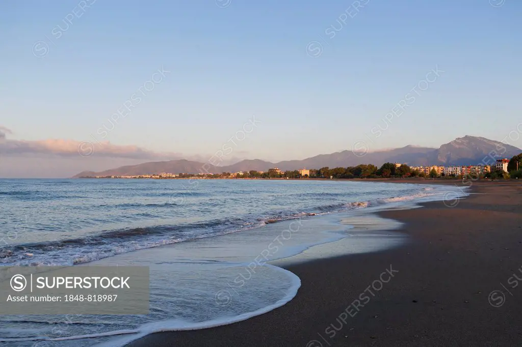 Early morning on the beach with Iskele district, Anamur, Mersin Province, Turkish Riviera, Turkey