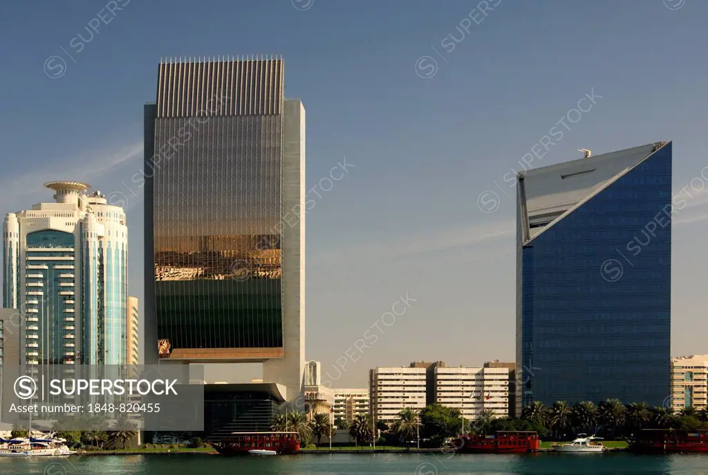 Modern architecture at Dubai Creek, from left, Dubai Creek Tower, National Bank of Dubai and the Chamber of Industry and Commerce, Dubai, United Arab ...