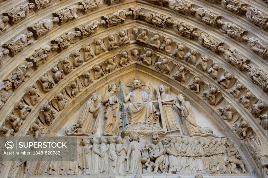 Stone carvings and sculptures over the main portal, Notre Dame de Paris cathedral, Paris, Ile-de-France, France