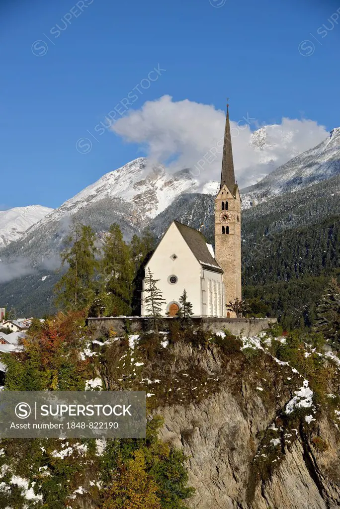 Reformed Church of St. George in front of mountains, Scuol, Lower Engadine, Canton of Grisons, Switzerland, Europe