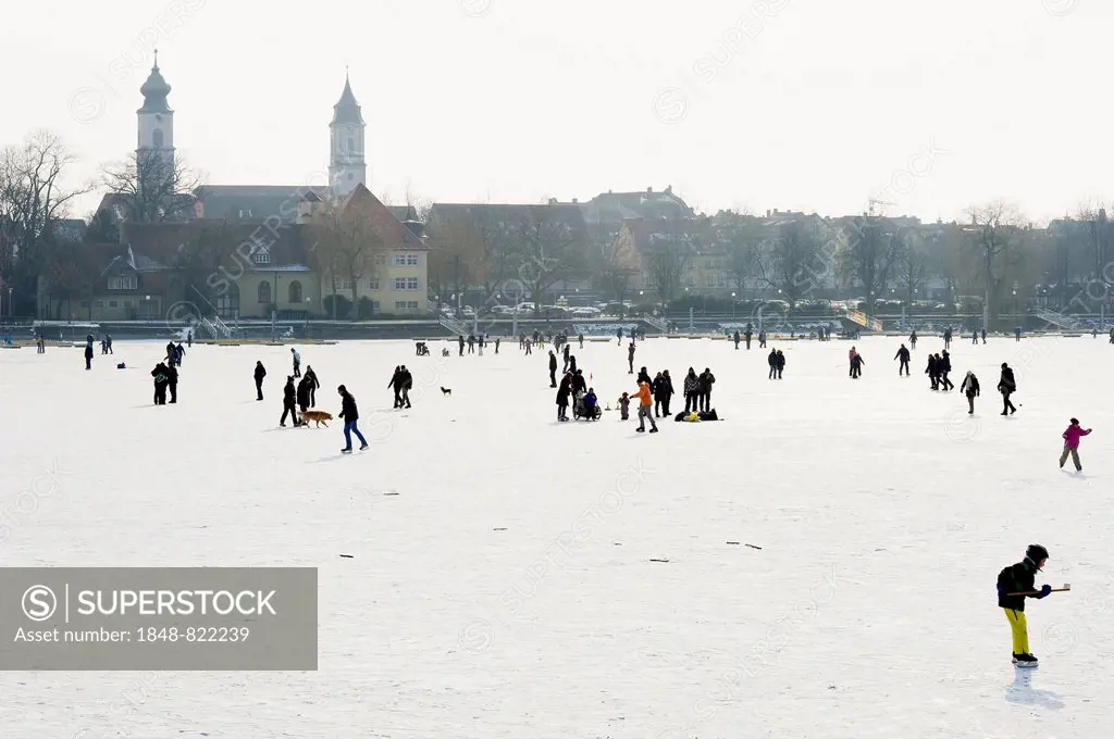 Skaters on the frozen Lake Constance, Lindau, Bavaria, Germany