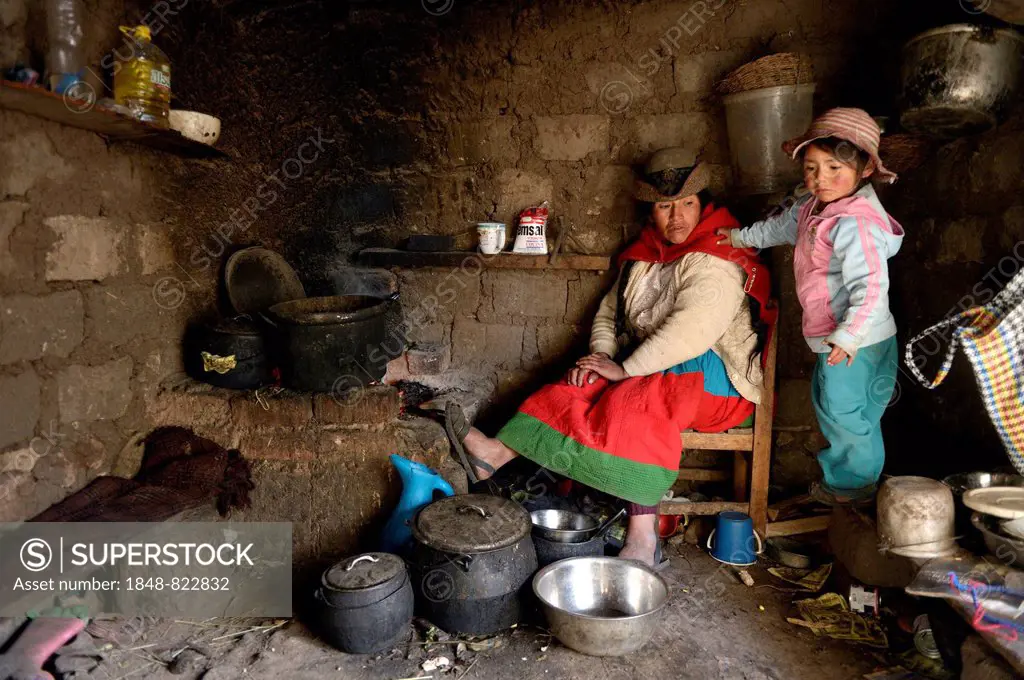 Mother and daughter in a traditional kitchen, Union Potrero, Quispillacta, Ayacucho, Peru