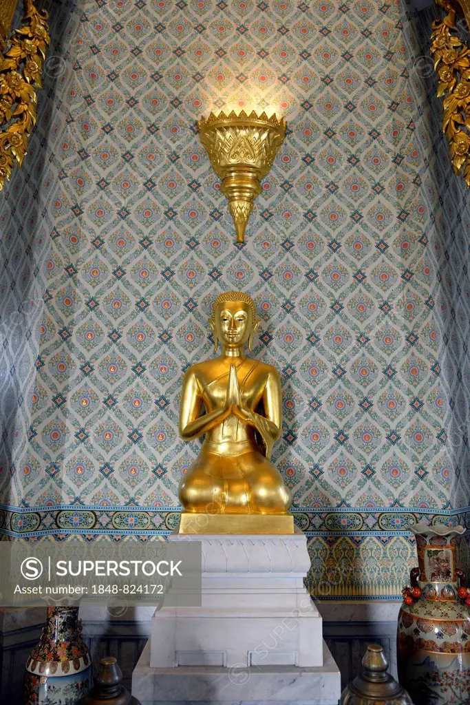 Buddha statue in the Temple of the Golden Buddha or Wat Traimit, Bangkok, Thailand