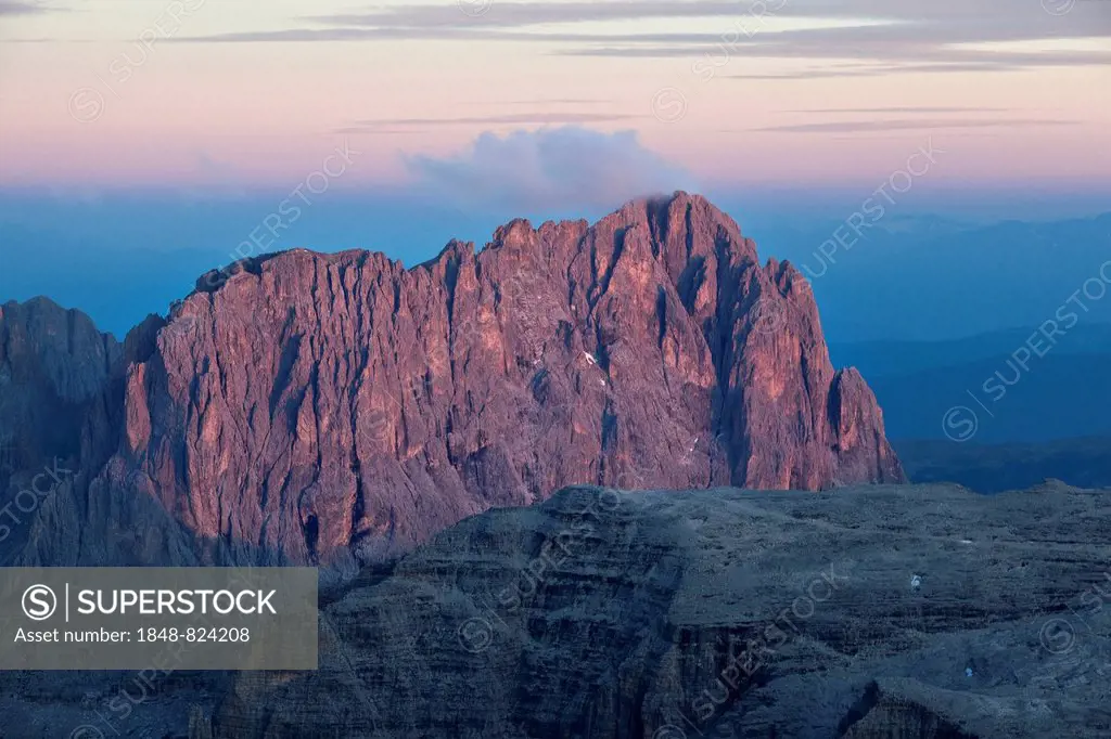 View from Pordoi Pass of mountains Sellastock and Langkofel or Sasso Lungo at dusk, Dolomites, South Tyrol, Alto Adige, Italy