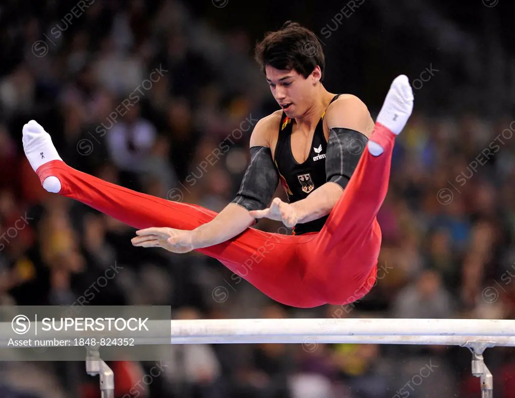 Daniel Weinert, GER, competing on the parallel bars, 31st DTB Cup, Gymnastics World Cup, Baden-Württemberg, Germany