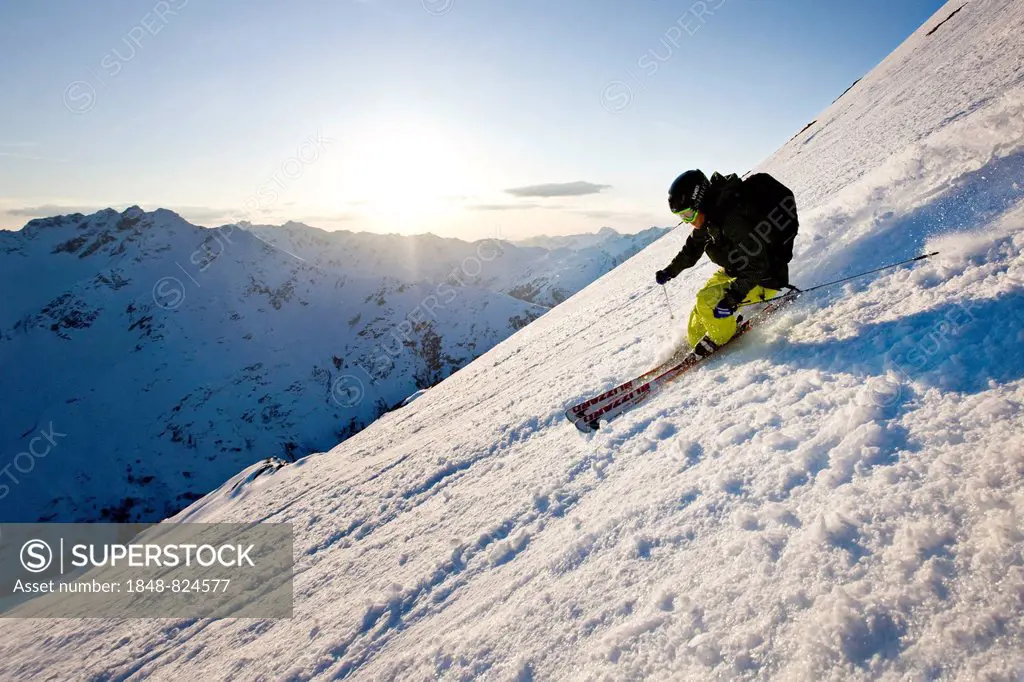 Freeride skier during descent, Arlberg, Verwall Group, North Tyrol, Austria