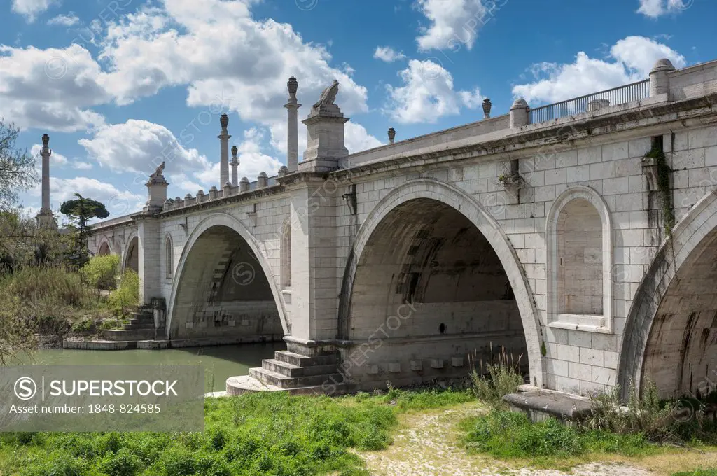 Duca d'Aosta bridge over the Tiber River, 1939 to 1942, access to the Foro Italico, formerly Foro Mussolini, symbols of the fascist ideology displayed...