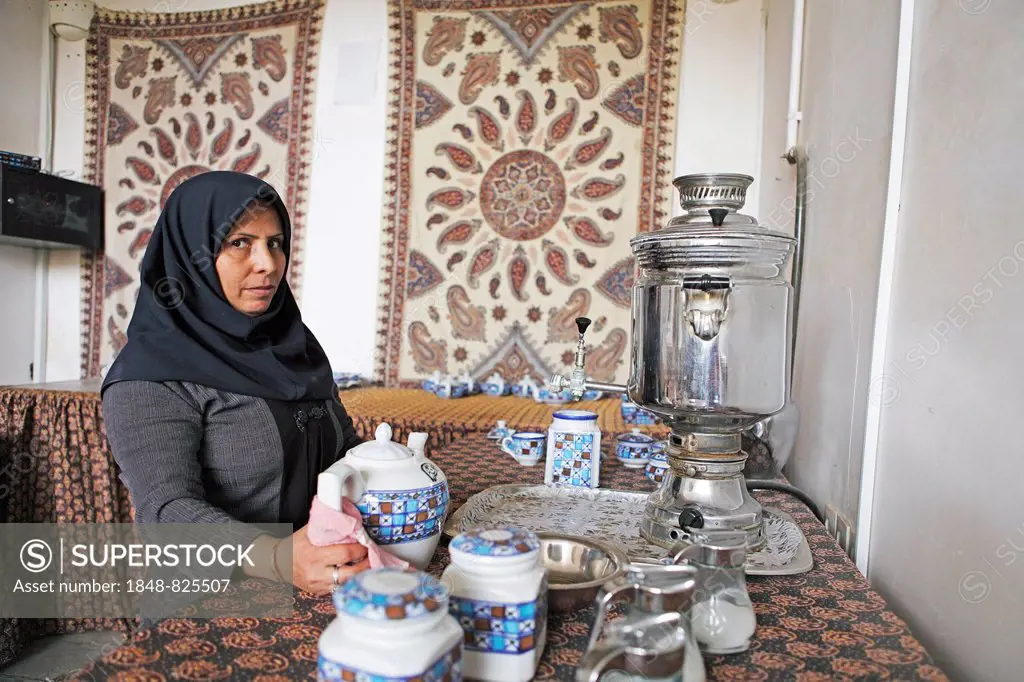 Woman preparing Iranian tea, Yazd, Yazd Province, Persia, Iran