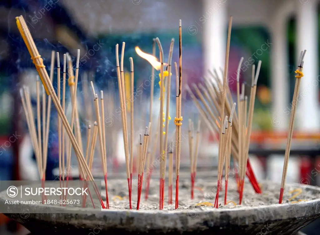 Joss sticks in front of the Wat Phra Si Rattana Mahathat Temple, Phitsanulok, Northern Thailand, Thailand