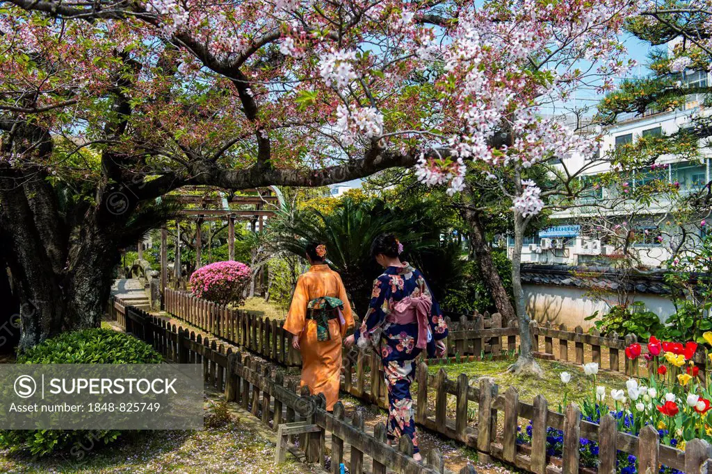 Women wearing traditional dresses, kimonos, Nagasaki, Japan