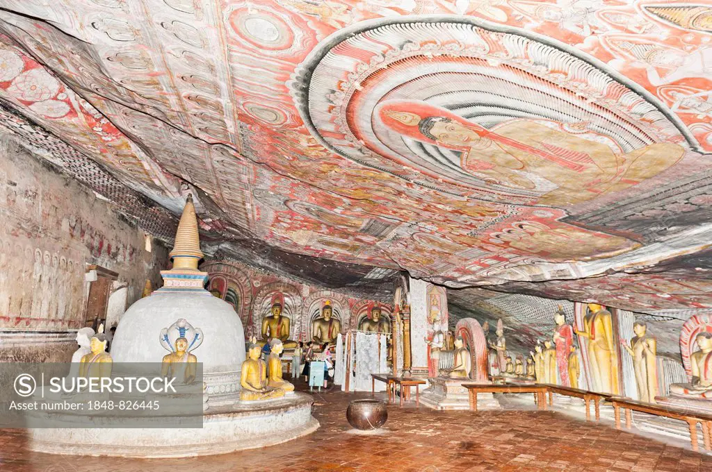 Fully painted interior room of the cave, colourful murals on the walls and the ceiling, frescoes, statues and a stupa, Maharaja-Iena cave, Buddhist ca...