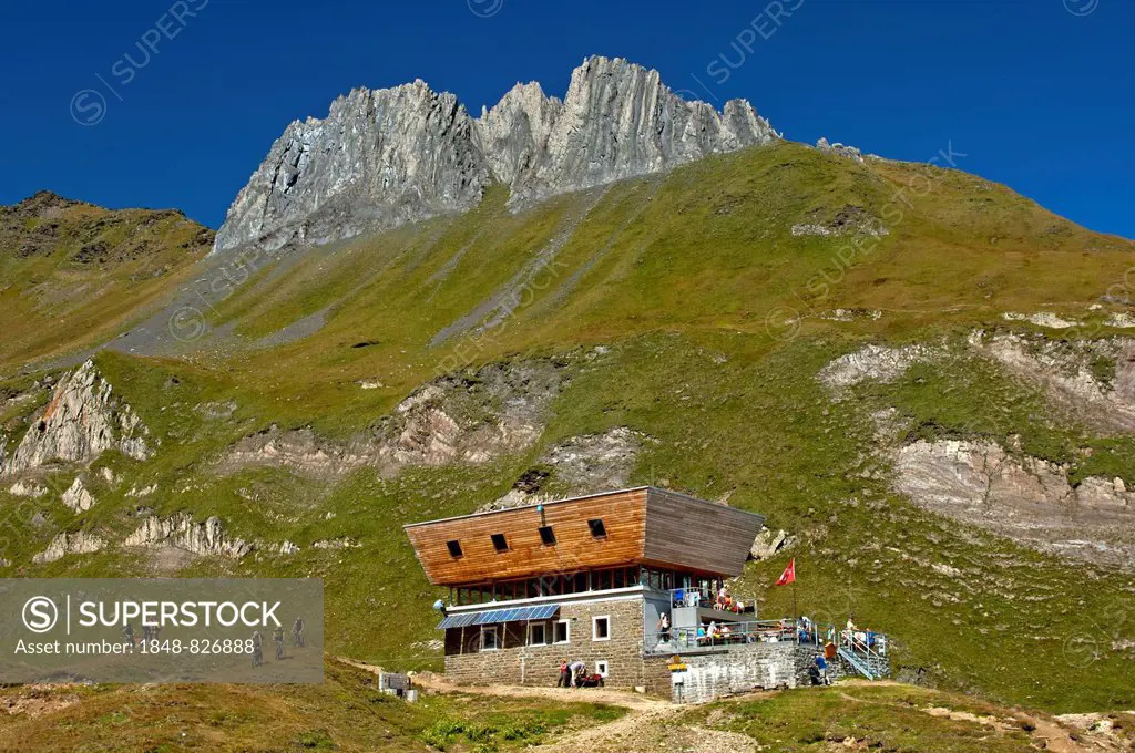 Capanna del Corno Gries, refuge of the Swiss Alpine Club SAC in front of the peaks of Mt Scaglia di Corno, Val Bedretto, Canton Ticino, Switzerland