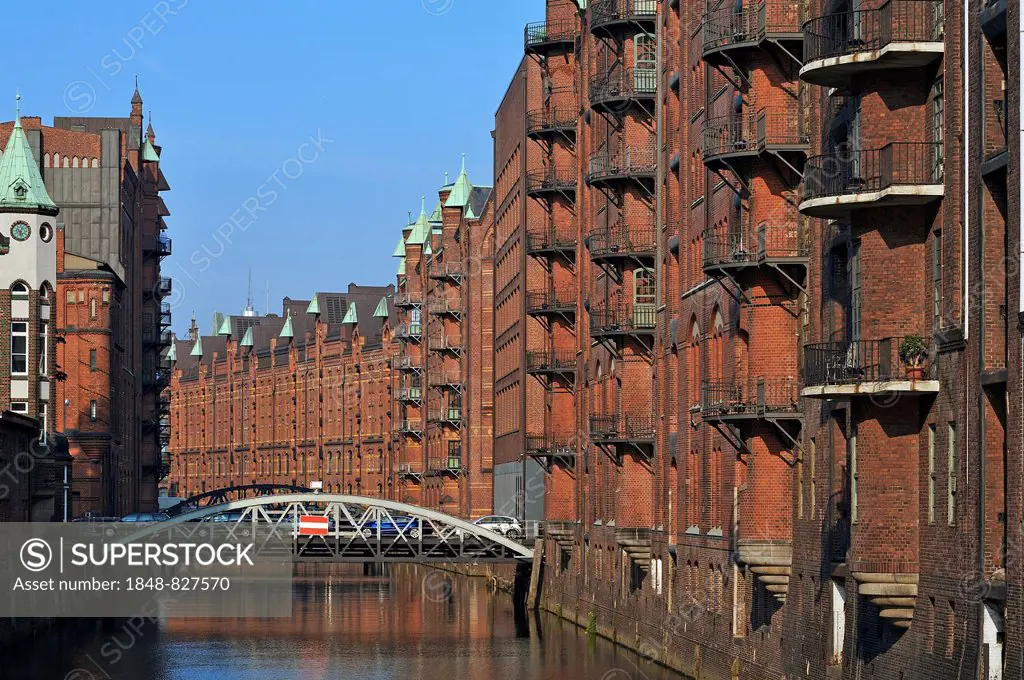 Buildings and Poggenmuehlenbruecke bridge in the Speicherstadt historic warehouse district, Hamburg, Germany