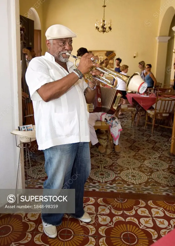 Cuban jazz musician playing in a restaurant, Plaza Mayor, Trinidad, Sancti-Spíritus province, Cuba, Latin America