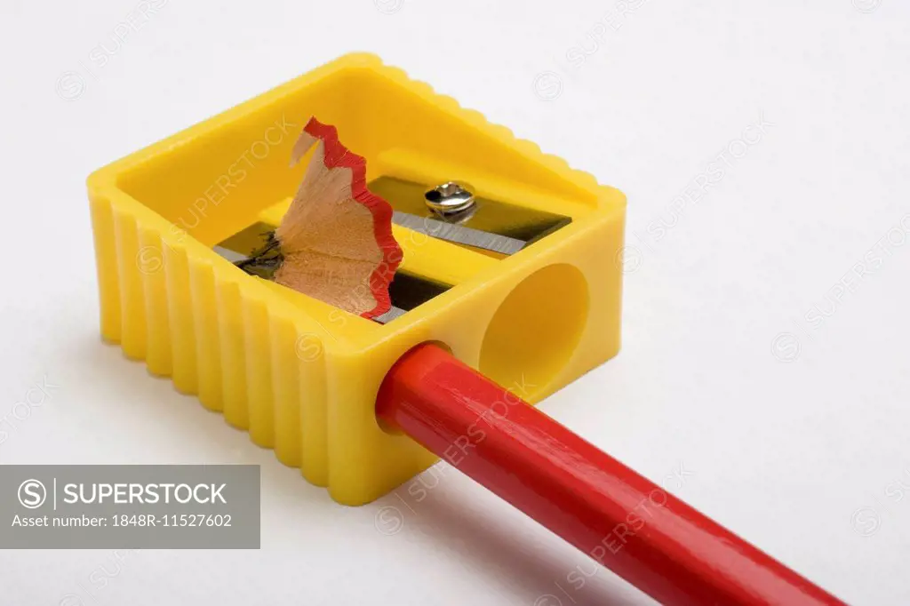 Red pencil and yellow pencil sharpener