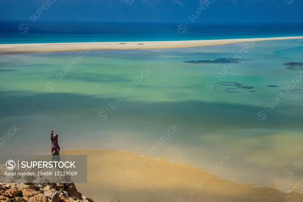 Yemenite man overlooking the Detwah lagoon, near Qalansia, Socotra, Yemen