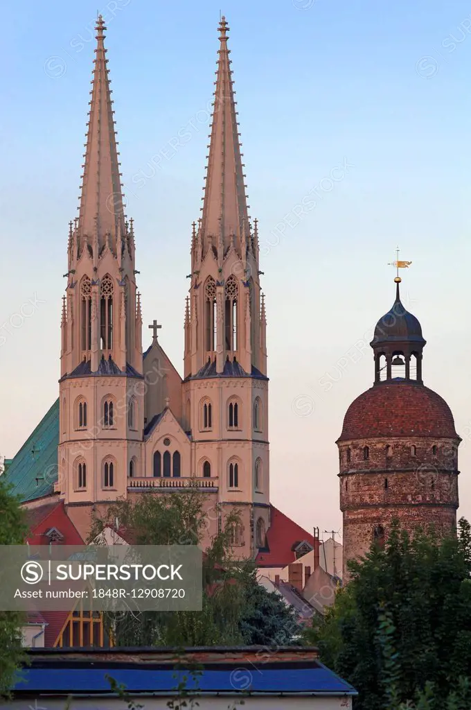 Towers of the late Gothic Church of St. Peter in the evening light, Nikolaiturm on the right, 1384 fortificated tower, Görlitz, Oberlausitz, Saxony, G...
