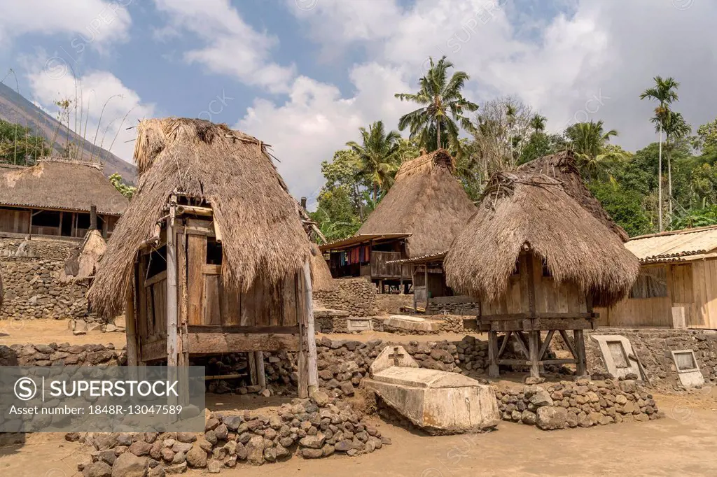 Village square with grave, shrines and traditional thatched wooden houses, Ngada village Bena, Bajawa, Flores Island, Indonesia