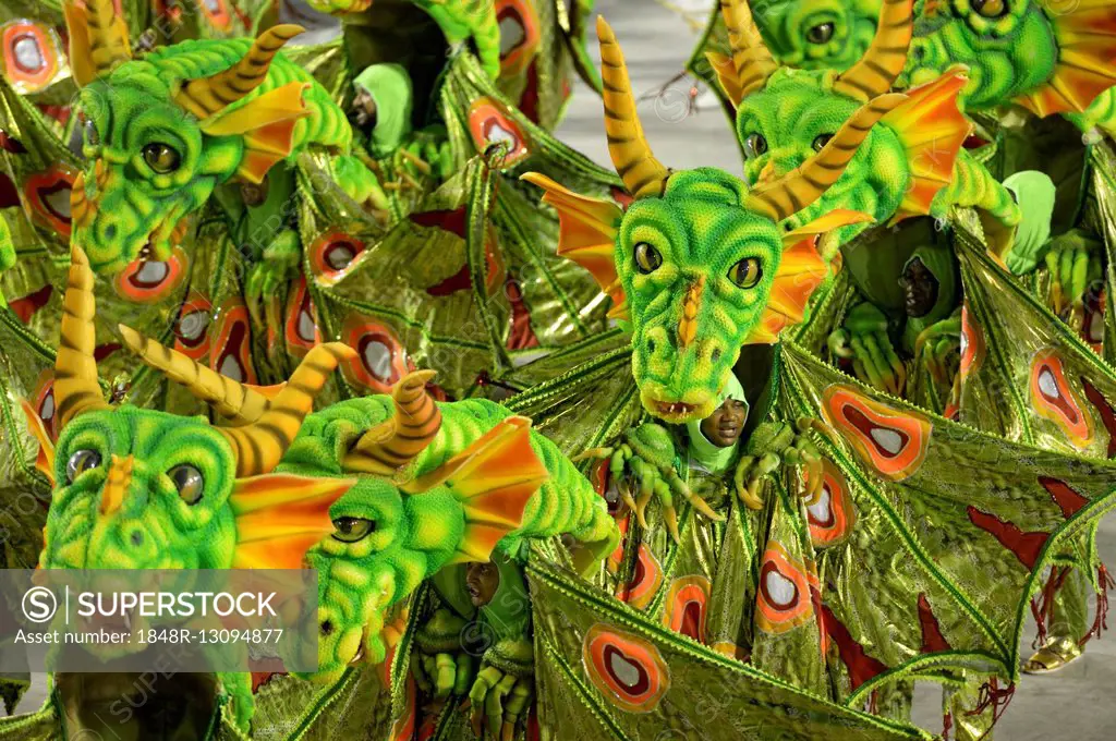 Dancers dressed as dragons, parade of the samba school Estacio de Sá, Carnival 2016 in the Sambadrome, Rio de Janeiro, Brazil