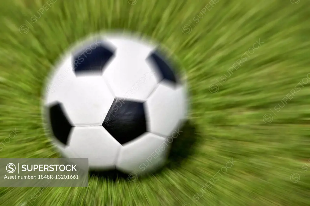 Wiping pattern black white soccer, leather ball and grass