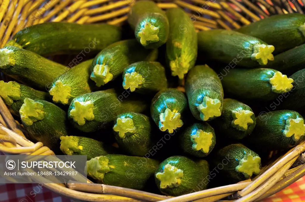 Zucchini on display in basket, market, France