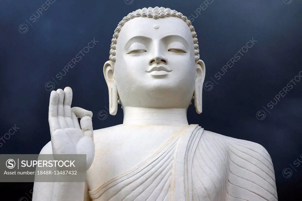 Buddha statue, stormy atmosphere, Mihintale, North Central Province, Sri Lanka
