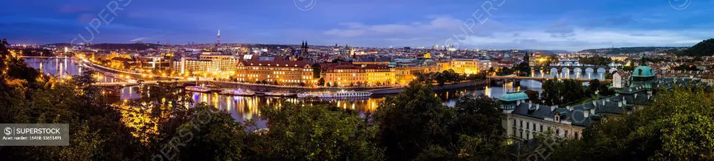 Cityscape at dusk, Vltava, Prague, Bohemia, Czech Republic