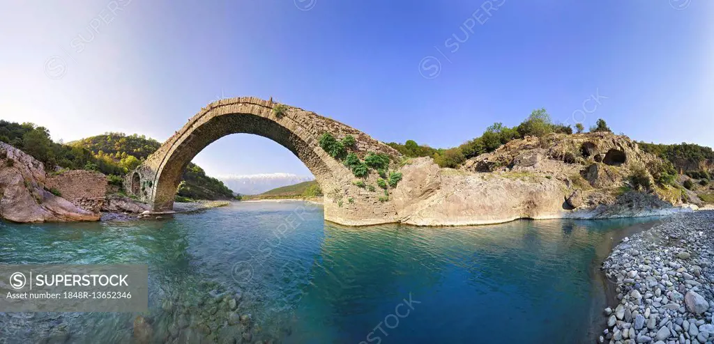 Stone bridge Ura e Kadiut, Turkish arch bridge across river Lengarica, Benje, Benja, Albania