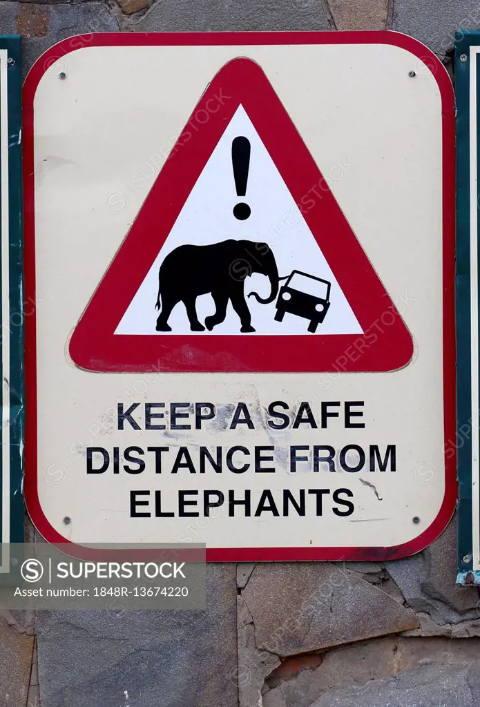 Warning sign keep safe distance from elephants, Hluhluwe-Imfolozi Park, South Africa