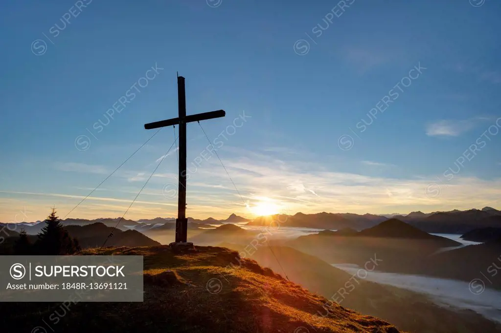 Sunrise, the summit cross at Hirschhörnlkopf, Jachenau, Isarwinkel, Upper Bavaria, Bavaria, Germany