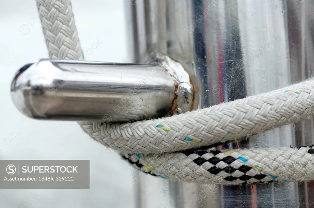 Sailing rope around a bollard - SuperStock