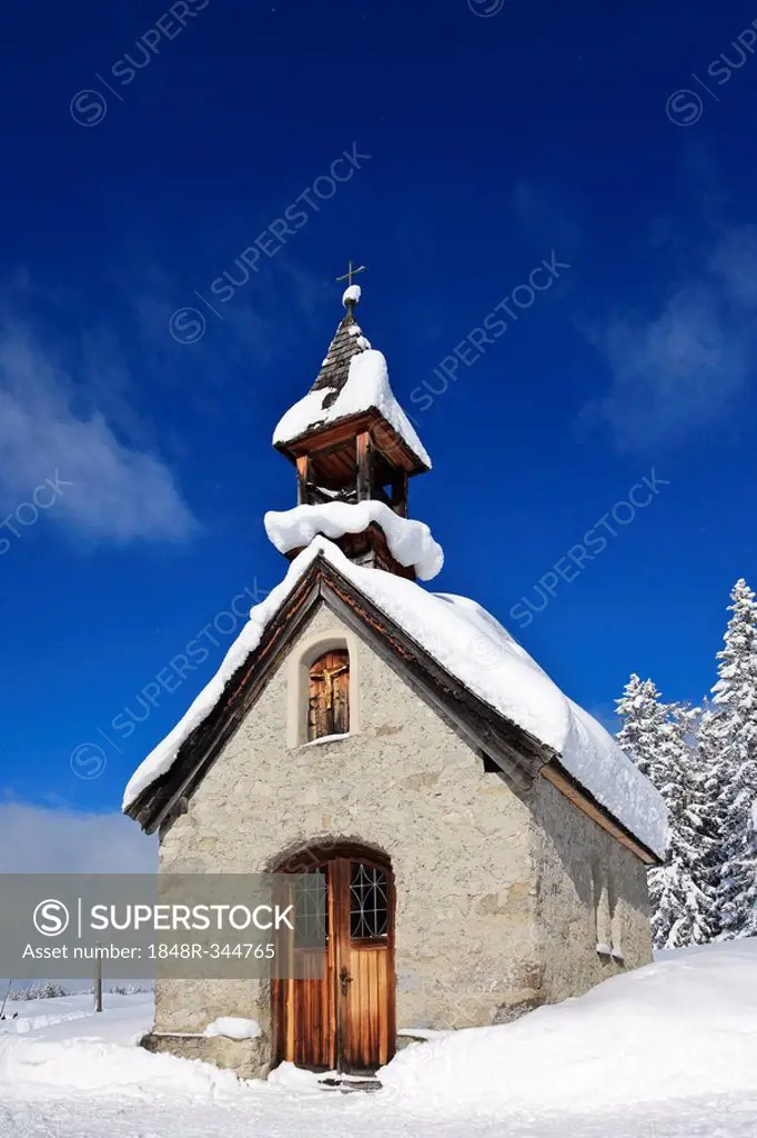 Snowy chapel in Traunstein, Bavaria, Germany, Europe