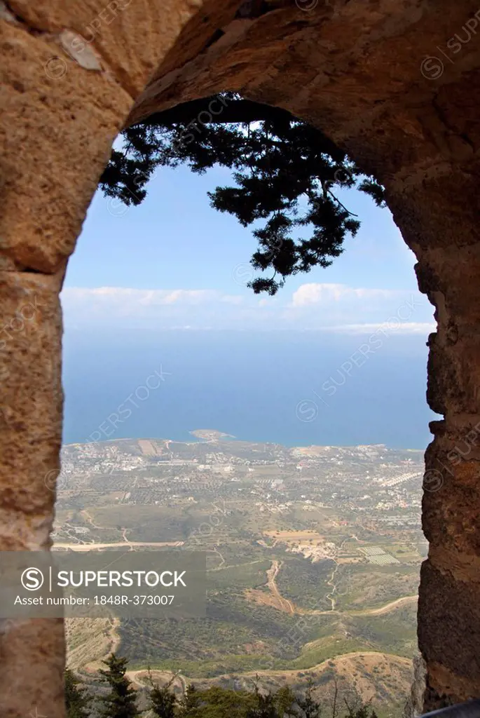 View out of a window of the old crusaders castle St. Hilarion at coast and sea North Cyprus